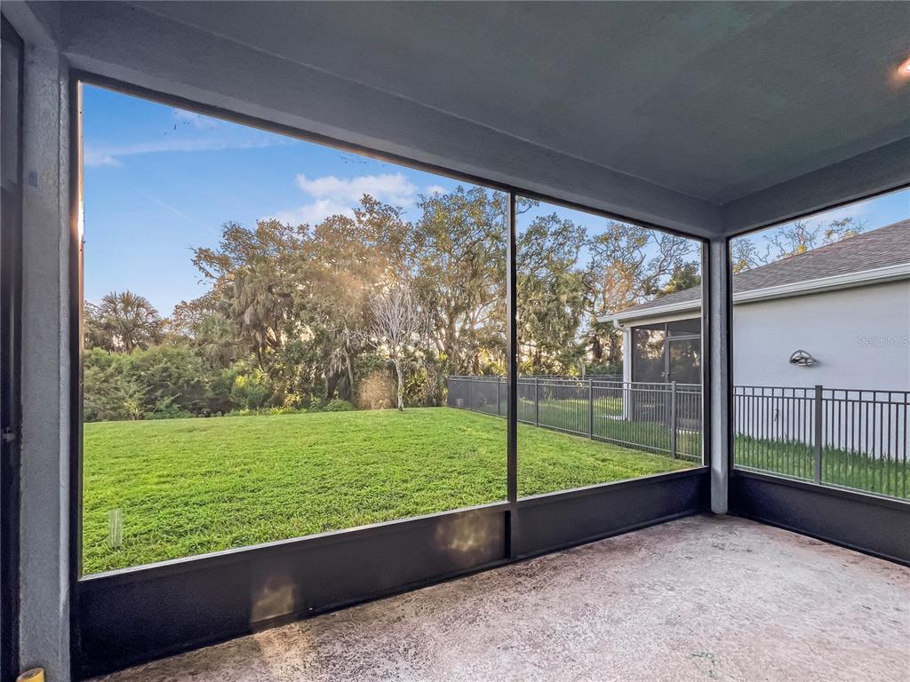 8511 Rain Lily Crossing Parrish, FL 34219 - Photo 13 of 34 a view of a yard with porch