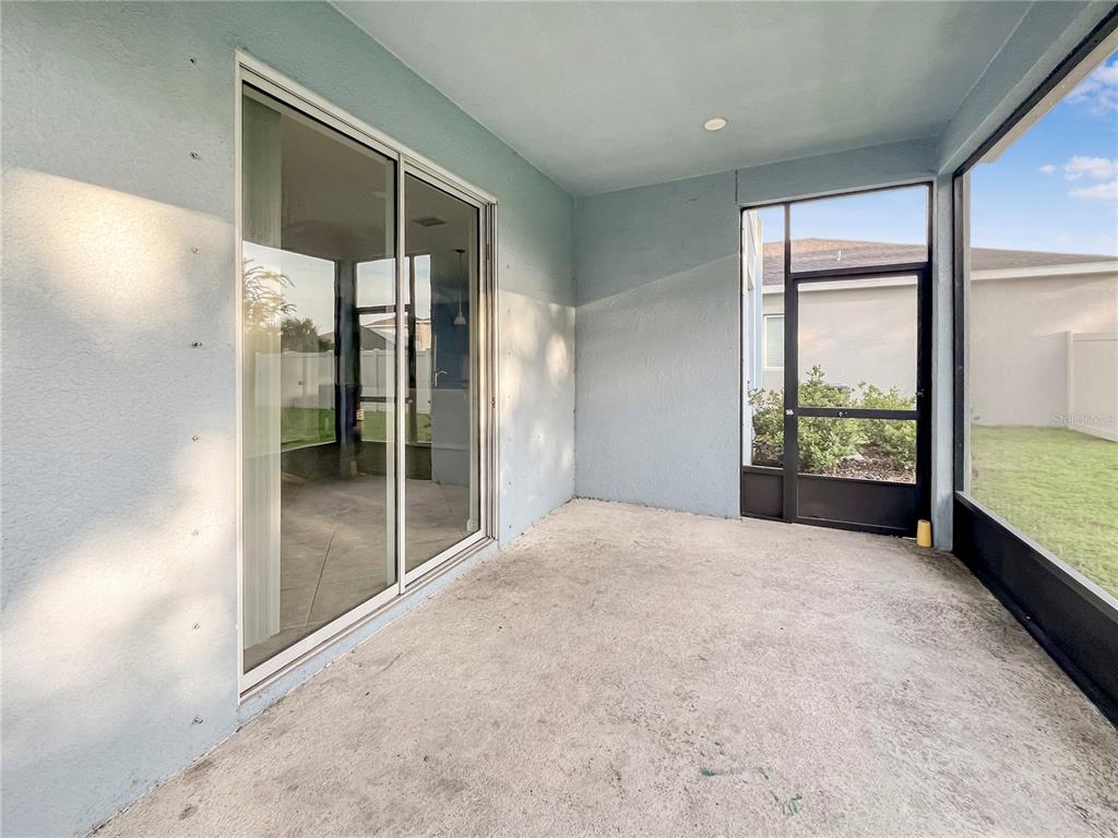 8511 Rain Lily Crossing Parrish, FL 34219 - Photo 15 of 34 a view of an empty room and window