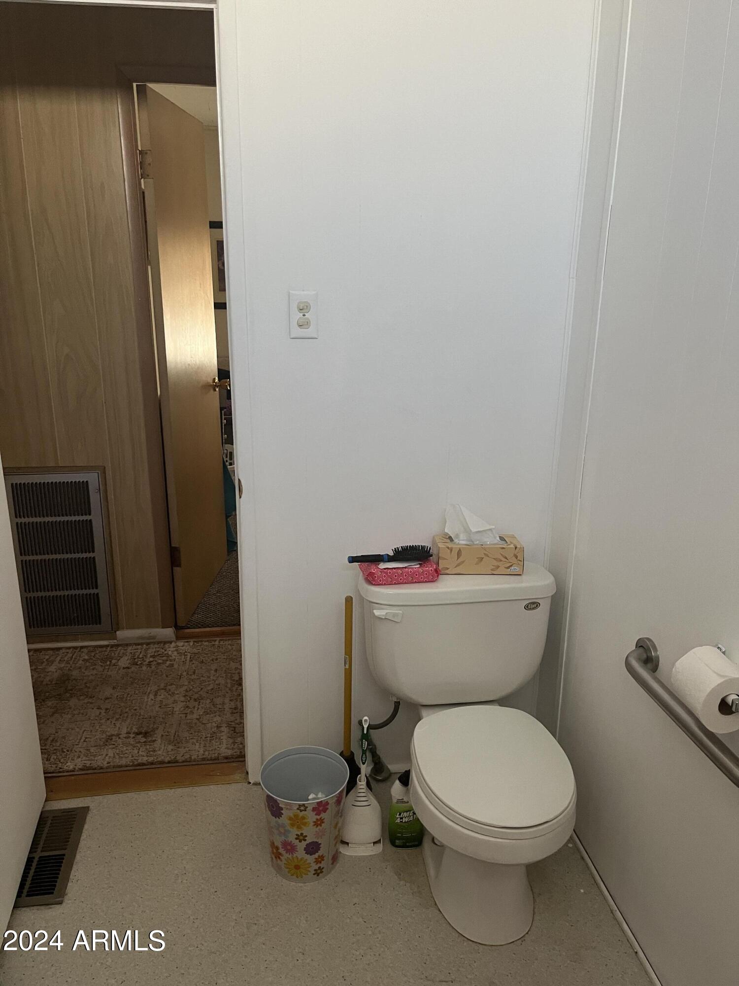 2460 East Main Street, Unit F2 Mesa, AZ 85213 - Photo 15 of 17 a white toilet sitting next to a sink