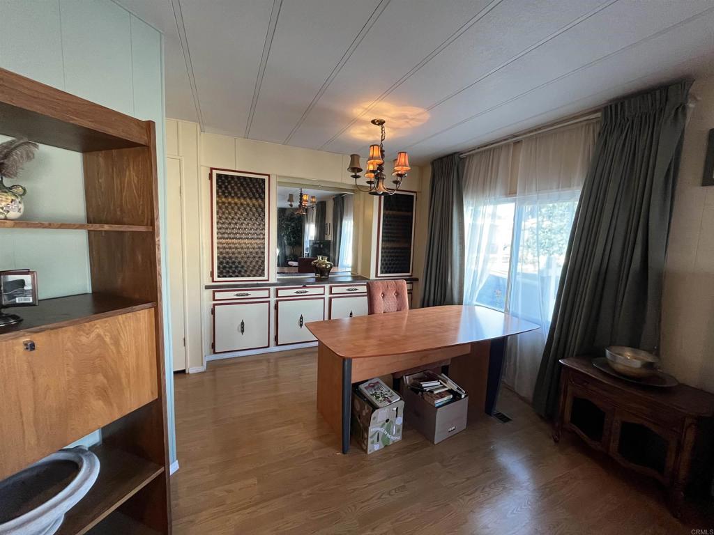 1810 Hillsdale Road, Unit 99 El Cajon, CA 92019 - Photo 6 of 15 a dining room with furniture and window