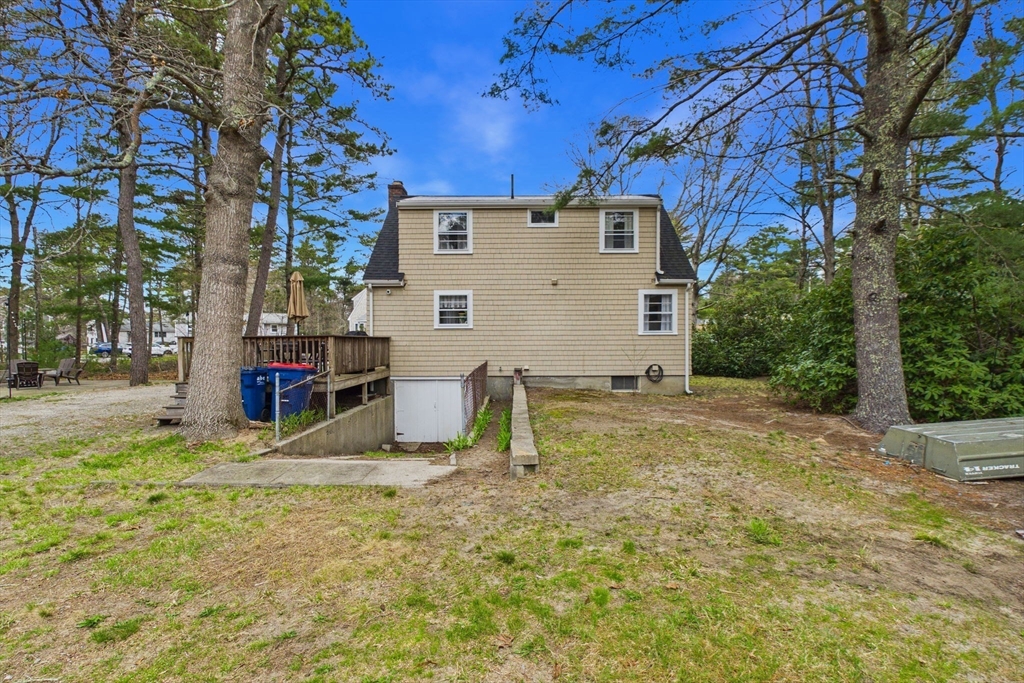 13 Albatross Avenue Wareham, MA 02538 - Photo 23 of 25 a view of a house with backyard and trees
