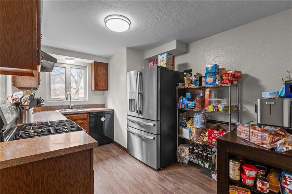 4 Harter Circle Pittsburgh, PA 15236 - Photo 17 of 29 a kitchen with a refrigerator and a stove top oven
