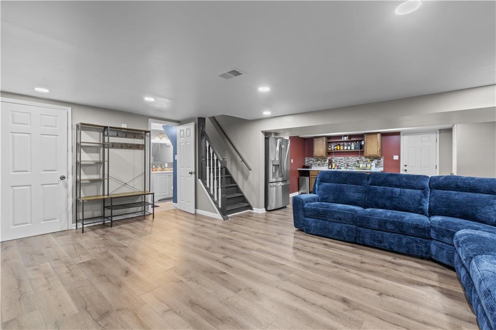 4 Harter Circle Pittsburgh, PA 15236 - Photo 23 of 29 a living room with a couch and a walk in closet