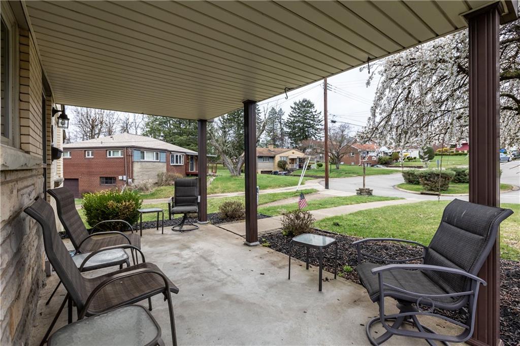 4 Harter Circle Pittsburgh, PA 15236 - Photo 28 of 29 a backyard of a house with outdoor seating