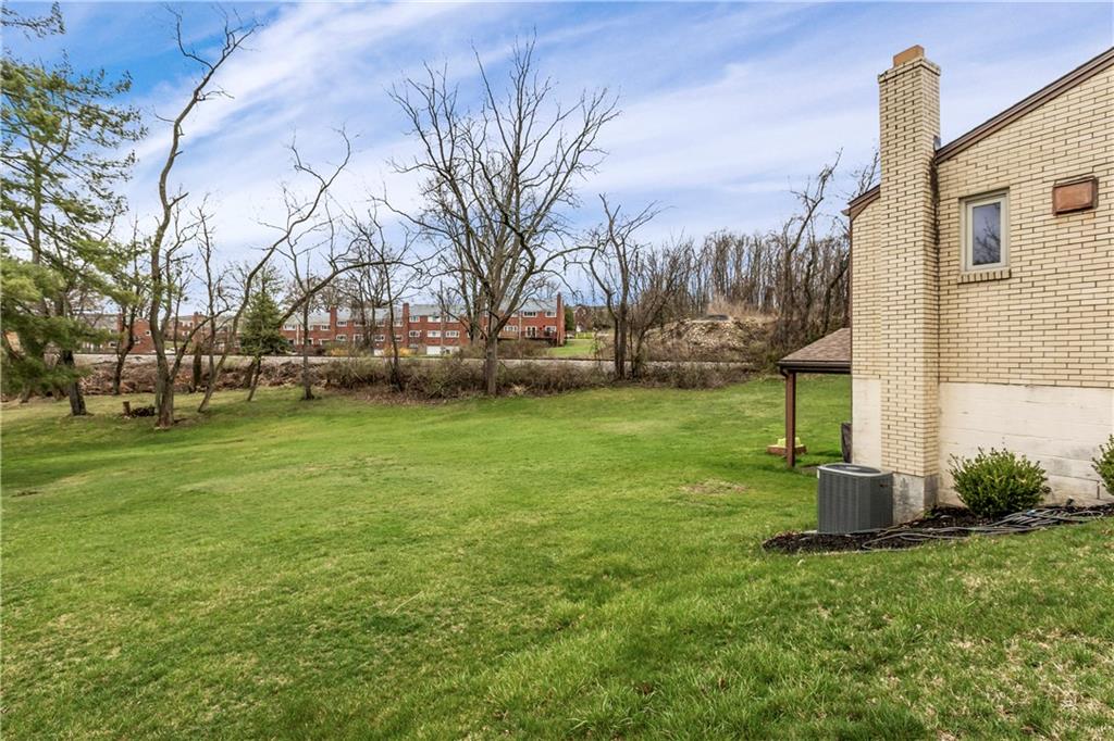 4 Harter Circle Pittsburgh, PA 15236 - Photo 3 of 29 a backyard of a house with lots of green space
