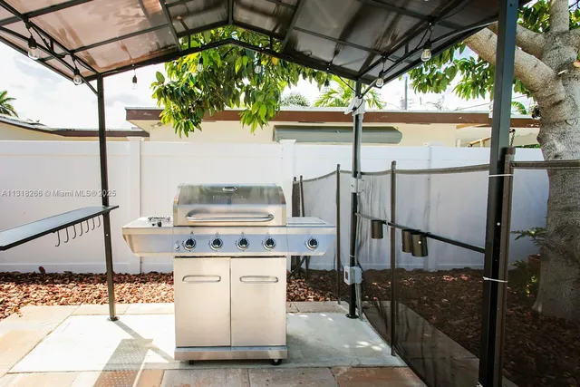 a utility room with washer and dryer