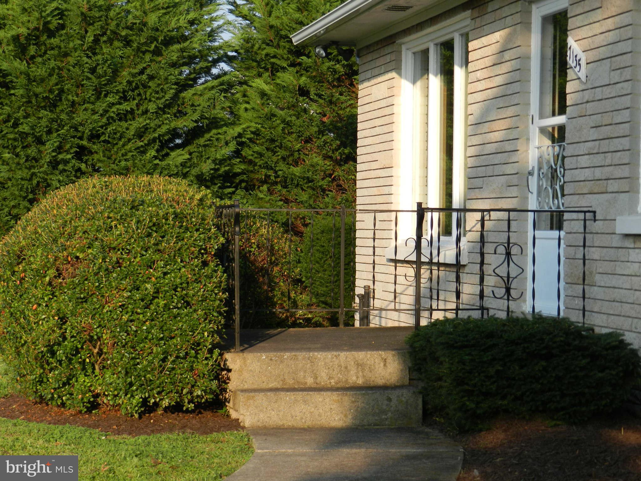 7135 Bowers Road Frederick, MD 21702 - Photo 2 of 30 a view of a house with a garden