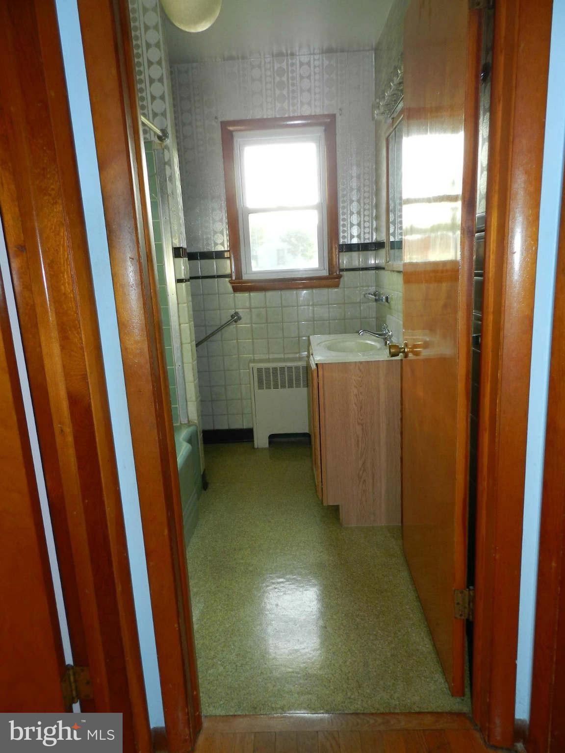 7135 Bowers Road Frederick, MD 21702 - Photo 17 of 30 a view of a bathroom with a sink and a window