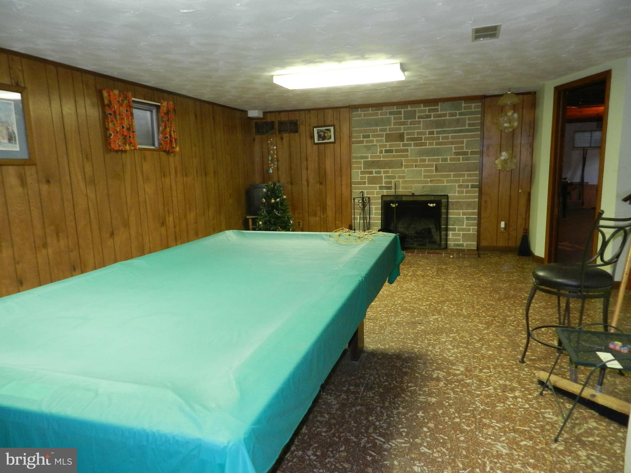 7135 Bowers Road Frederick, MD 21702 - Photo 21 of 30 a view of an empty room with a fireplace