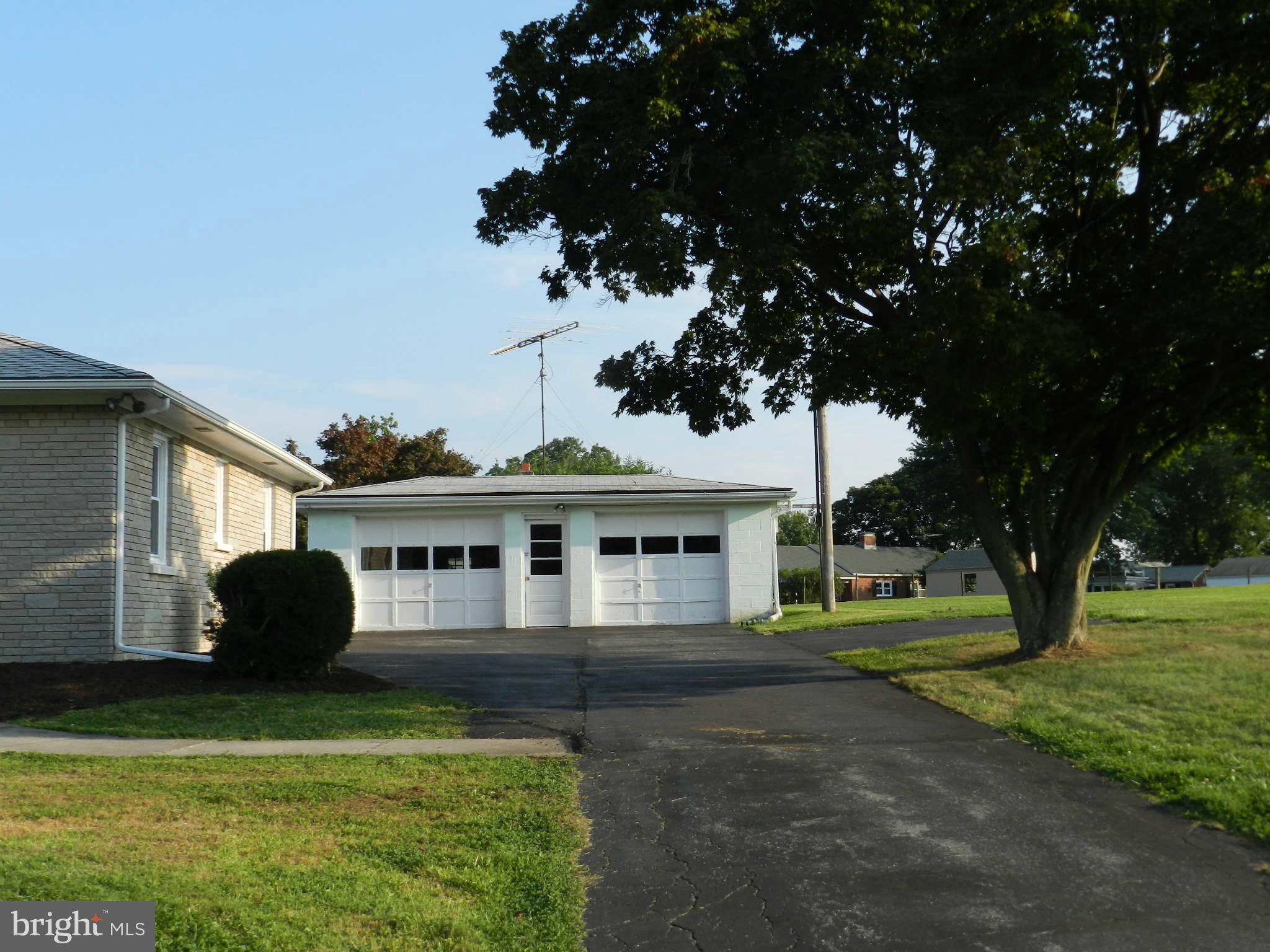 7135 Bowers Road Frederick, MD 21702 - Photo 4 of 30 a front view of a house with a yard