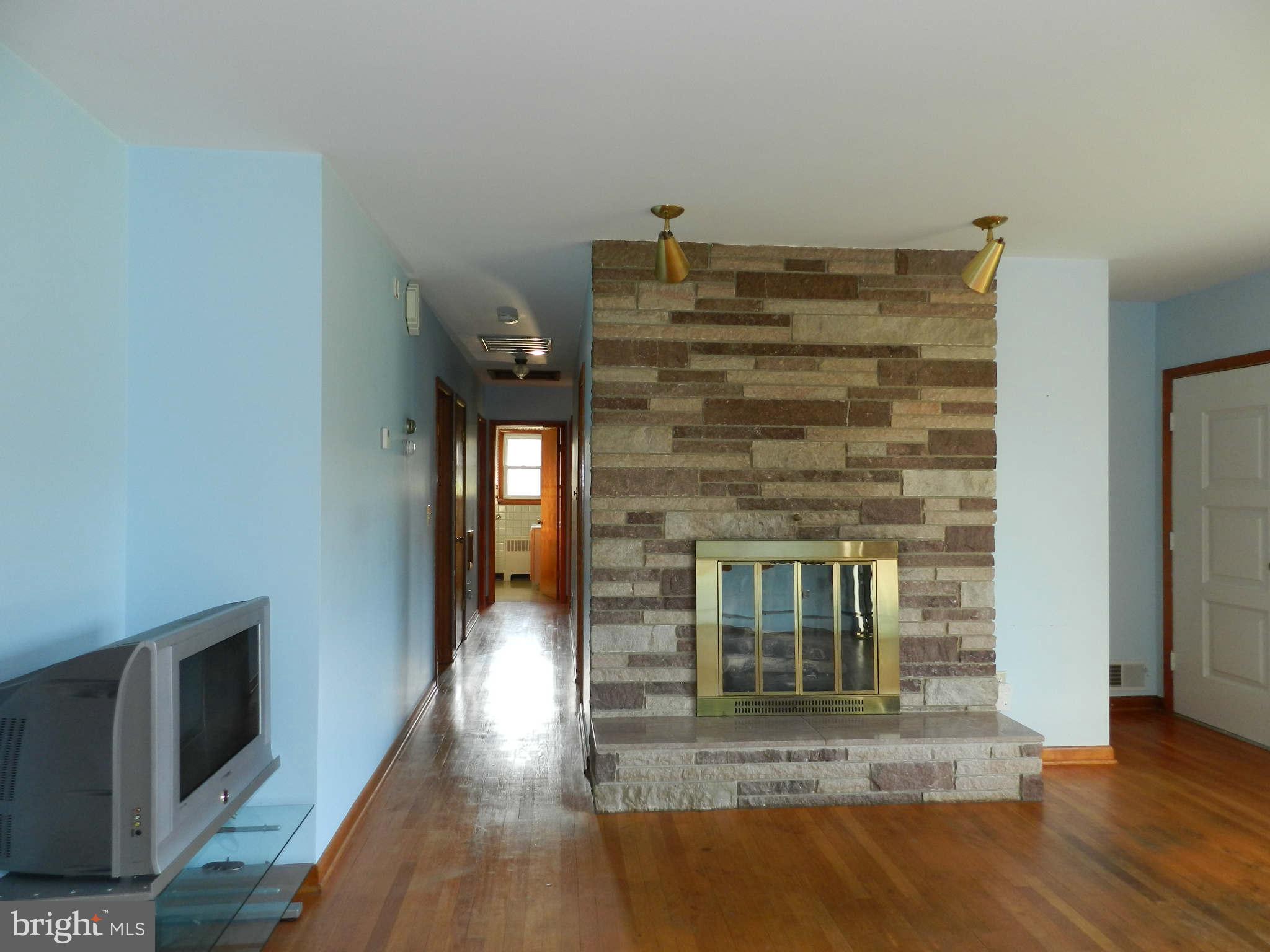 7135 Bowers Road Frederick, MD 21702 - Photo 8 of 30 a view of livingroom and hall with wooden floor