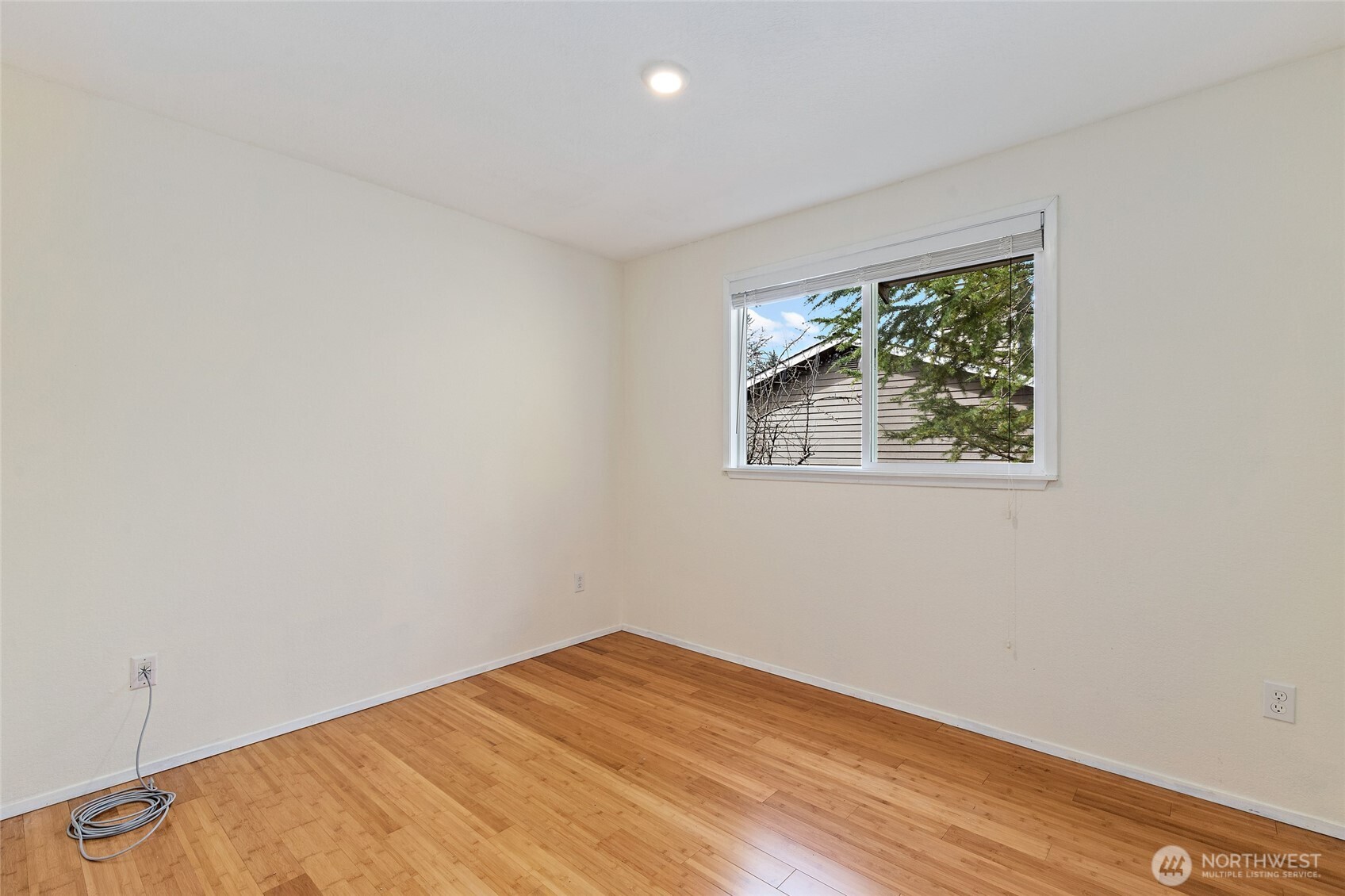 4813 150th Place Southwest Edmonds, WA 98026 - Photo 21 of 28 a view of empty room with wooden floor