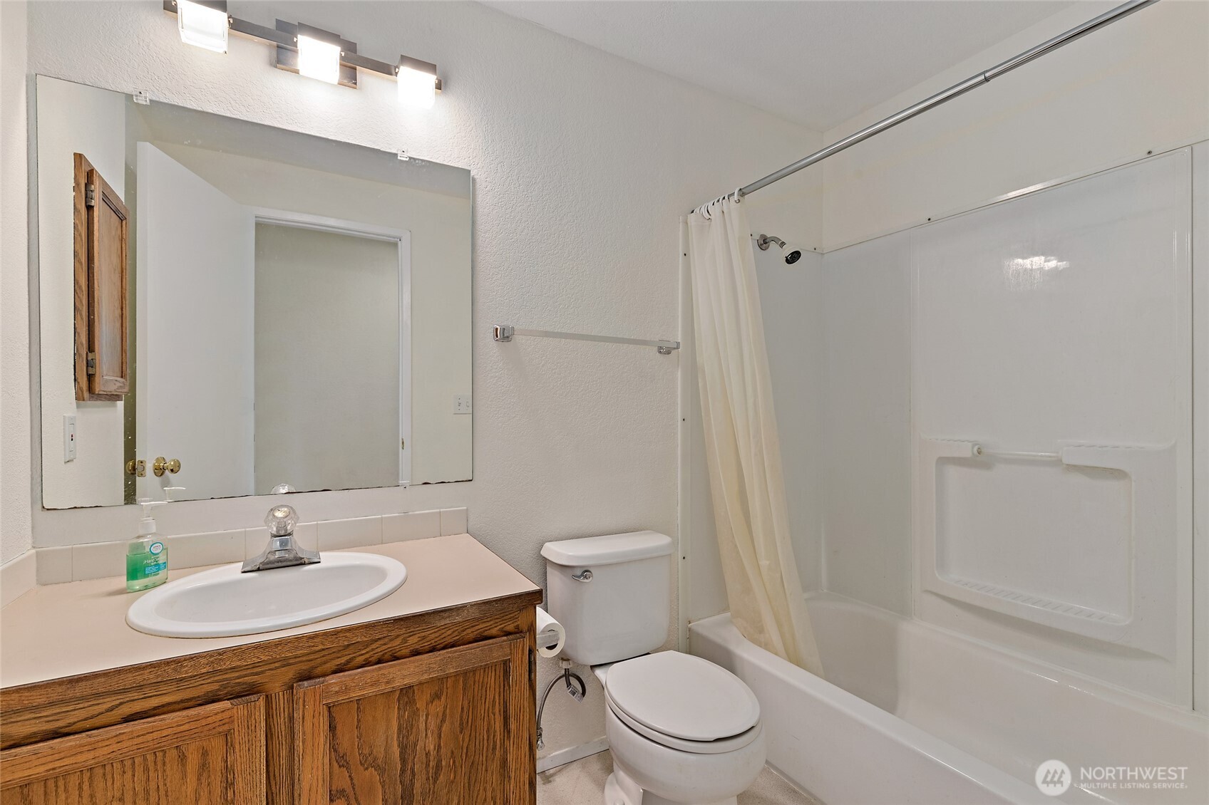 4813 150th Place Southwest Edmonds, WA 98026 - Photo 22 of 28 a bathroom with a sink a toilet and shower