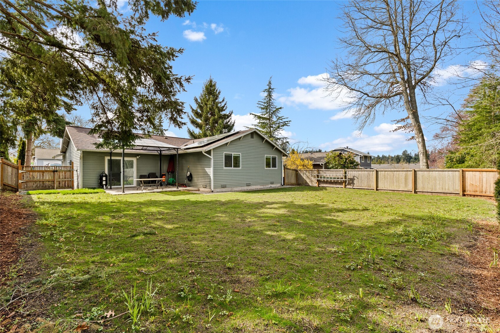 4813 150th Place Southwest Edmonds, WA 98026 - Photo 24 of 28 a front view of house with yard and trees