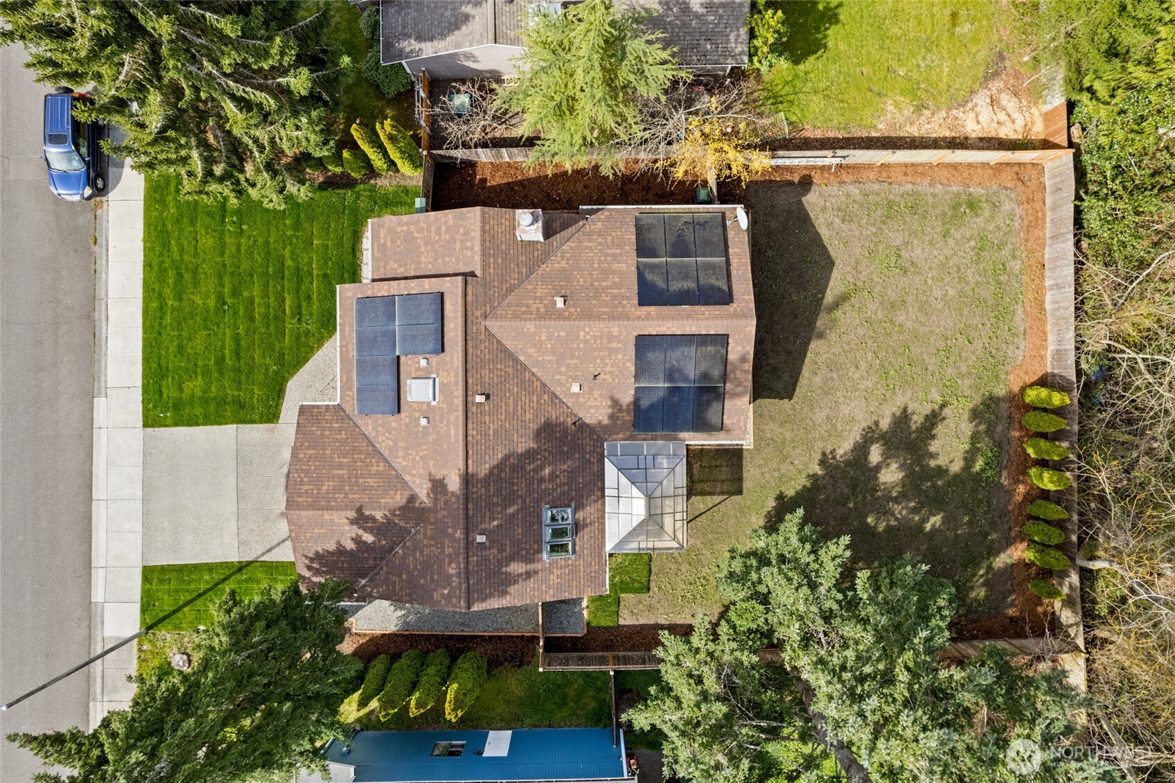 4813 150th Place Southwest Edmonds, WA 98026 - Photo 26 of 28 an aerial view of a house with a yard