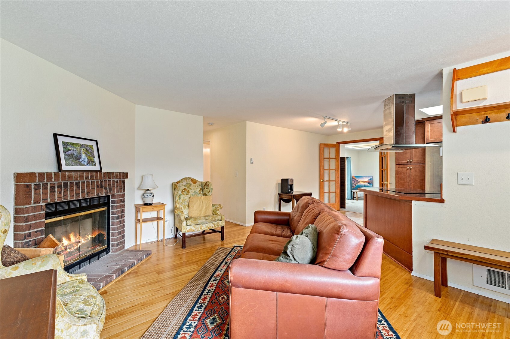 4813 150th Place Southwest Edmonds, WA 98026 - Photo 5 of 28 a living room with furniture fireplace and a fireplace