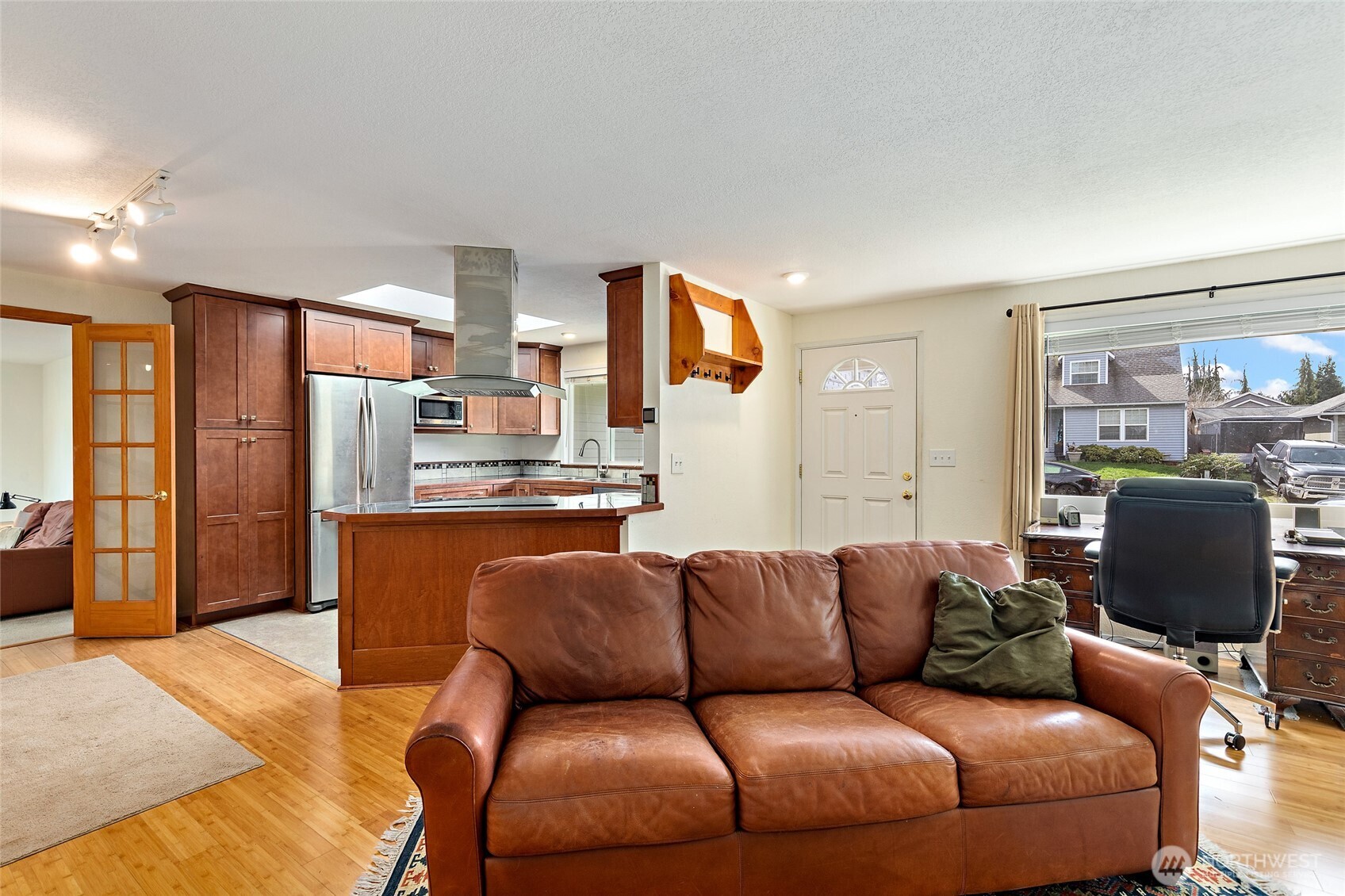 4813 150th Place Southwest Edmonds, WA 98026 - Photo 6 of 28 a living room with furniture and a flat screen tv