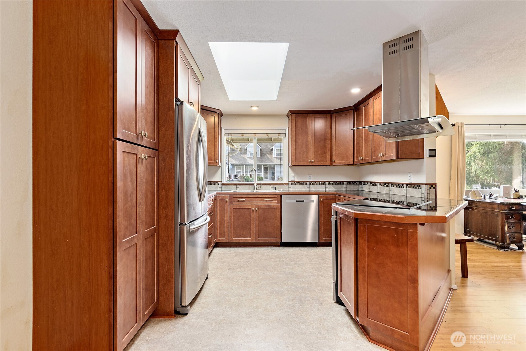 4813 150th Place Southwest Edmonds, WA 98026 - Photo 9 of 28 a kitchen with stainless steel appliances granite countertop a refrigerator and a stove top oven
