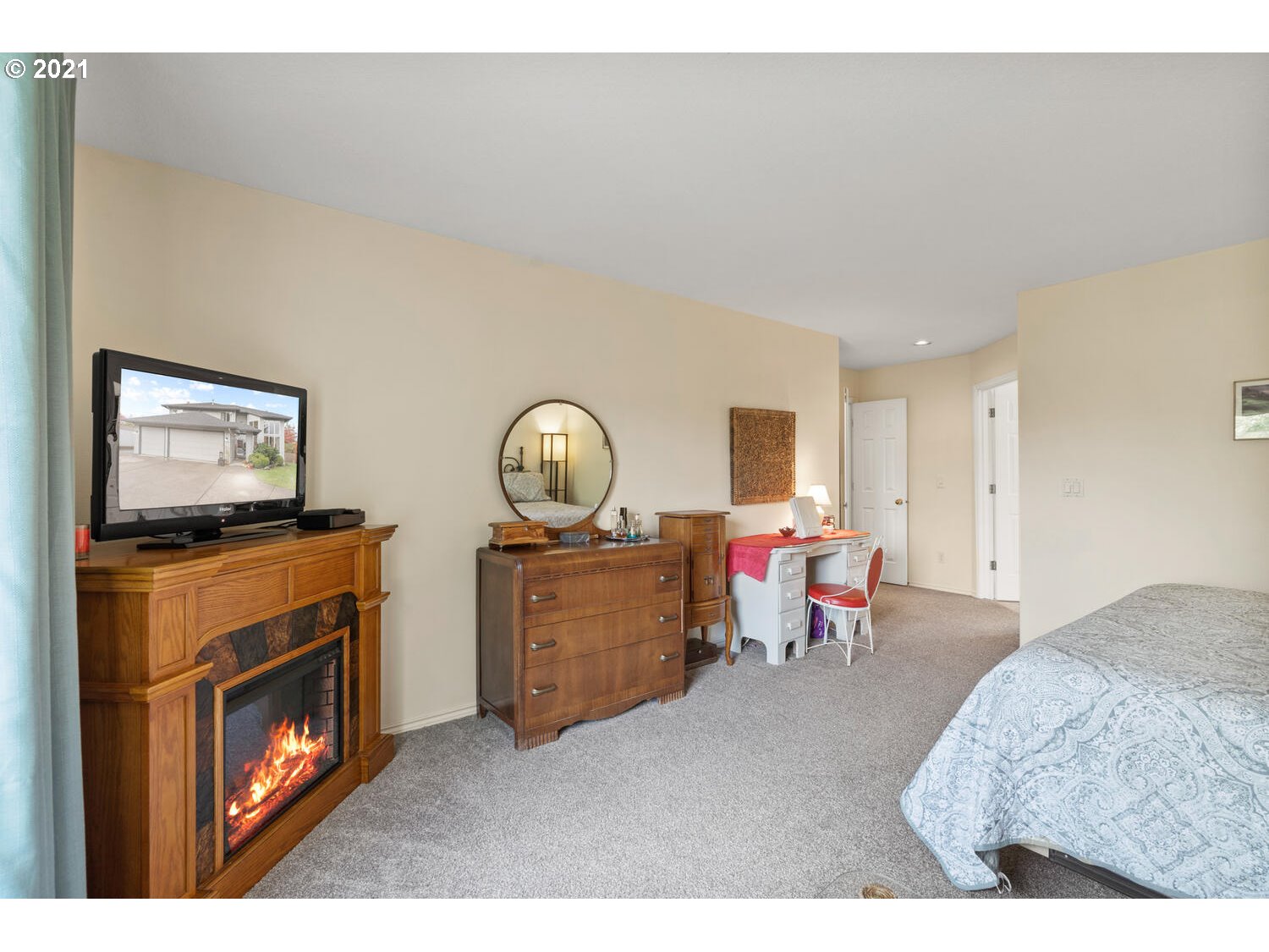 16980 Southwest Ferrelo Place Beaverton, OR 97007 - Photo 17 of 32 a living room with furniture and a fireplace