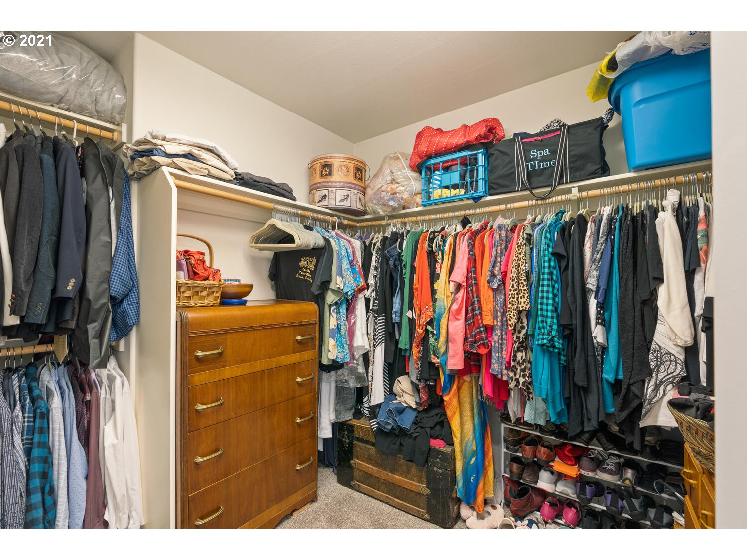 16980 Southwest Ferrelo Place Beaverton, OR 97007 - Photo 21 of 32 a view of walk in closet with clothes