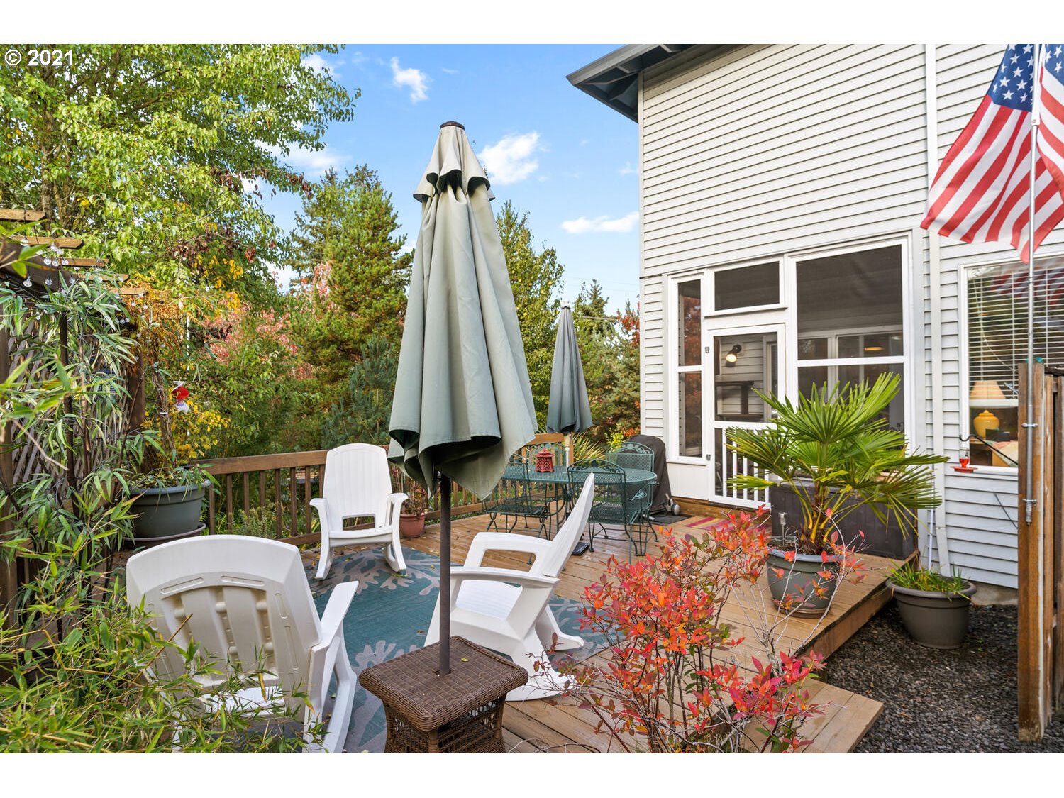 16980 Southwest Ferrelo Place Beaverton, OR 97007 - Photo 28 of 32 a view of a patio with chairs and potted plants