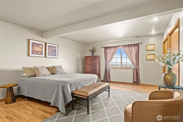 a room with cabinets and wooden floor