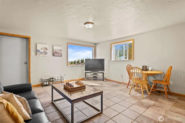 a kitchen with refrigerator and cabinets
