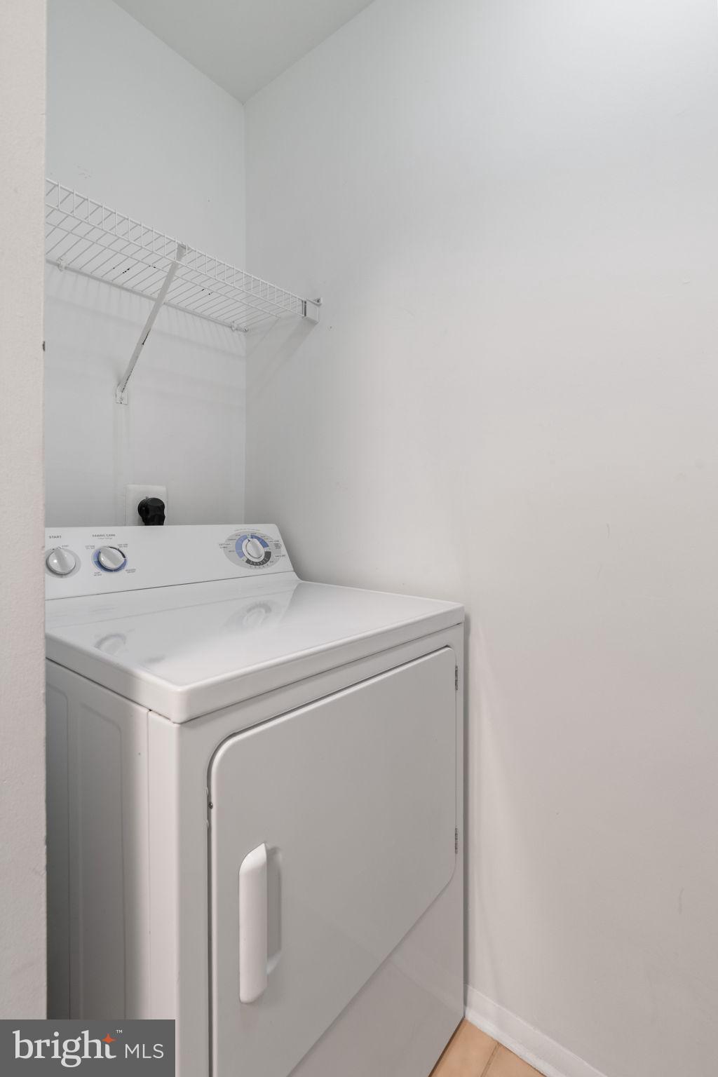 11703 Olde English Drive, Unit B Reston, VA 20190 - Photo 15 of 32 a utility room with dryer and washer