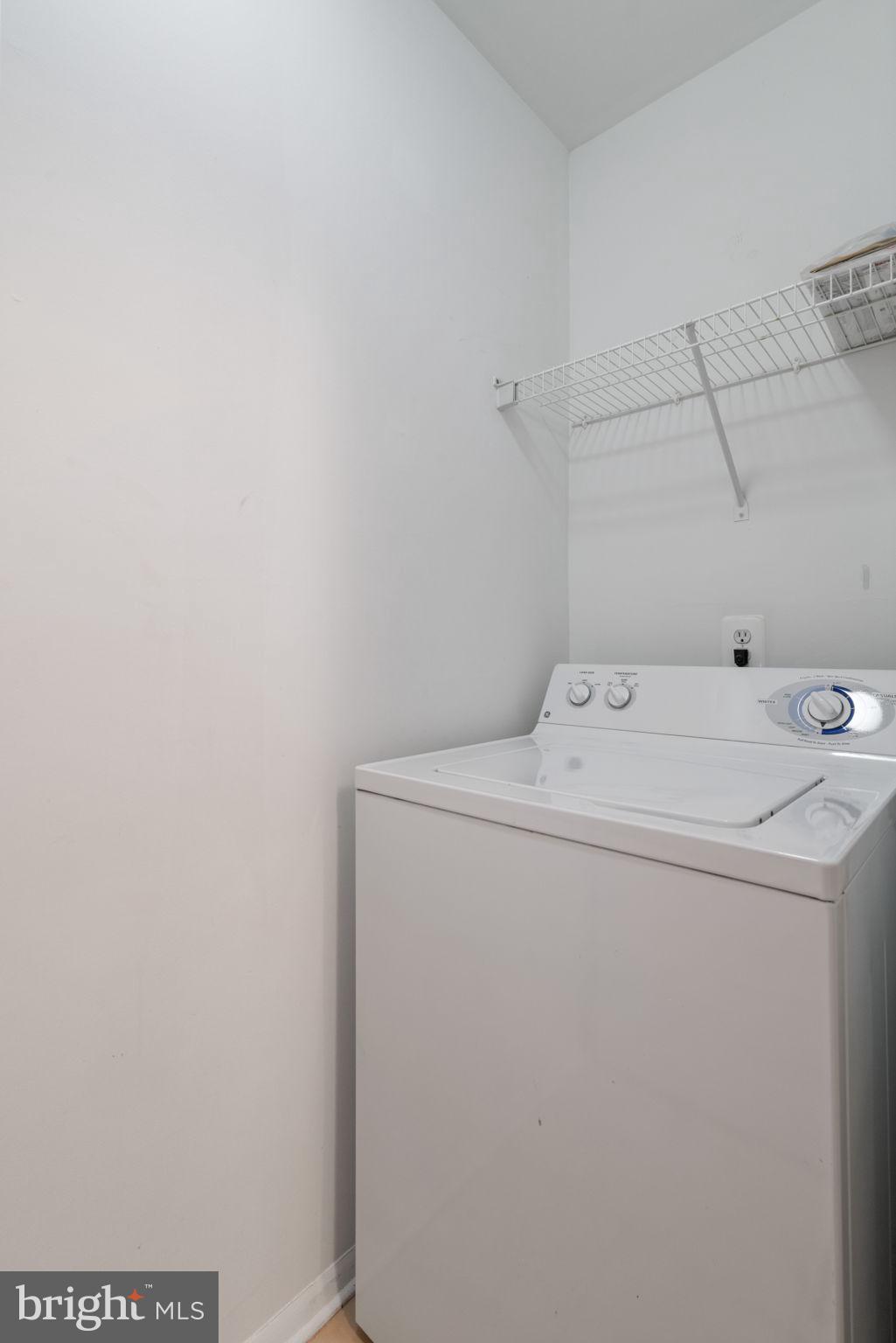 11703 Olde English Drive, Unit B Reston, VA 20190 - Photo 16 of 32 a utility room with dryer and washer