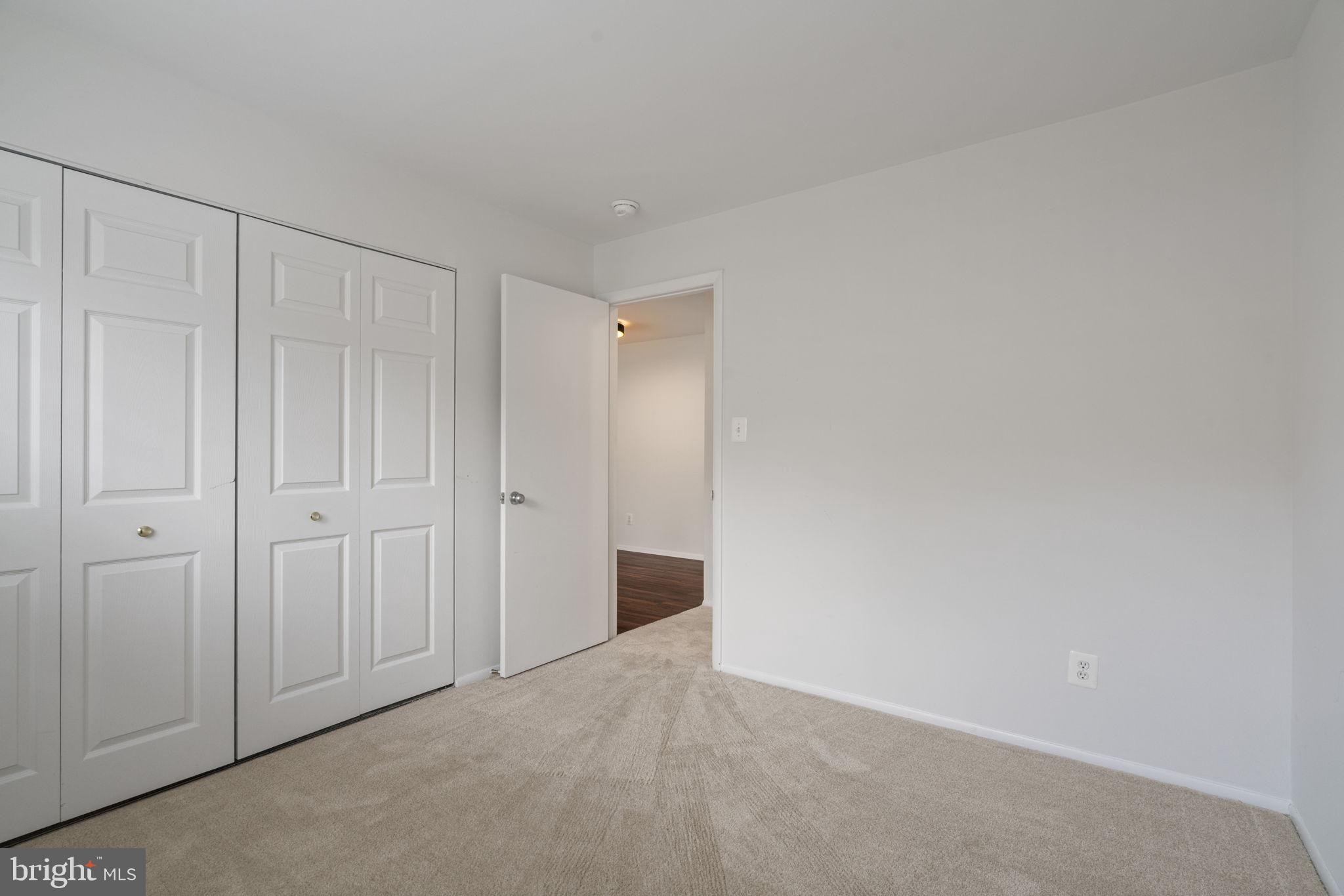 11703 Olde English Drive, Unit B Reston, VA 20190 - Photo 19 of 32 a view of an empty room