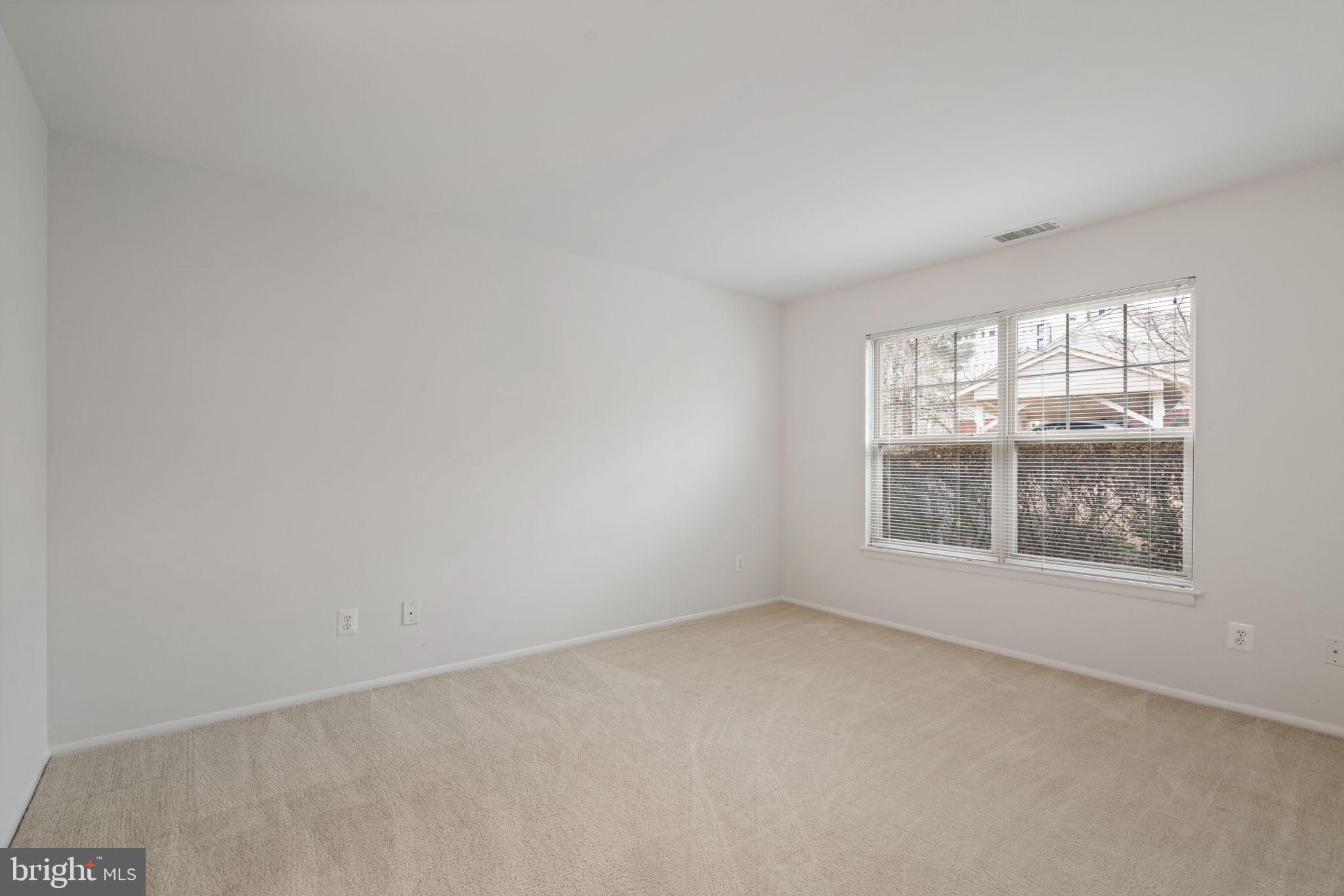 11703 Olde English Drive, Unit B Reston, VA 20190 - Photo 20 of 32 an empty room with a window