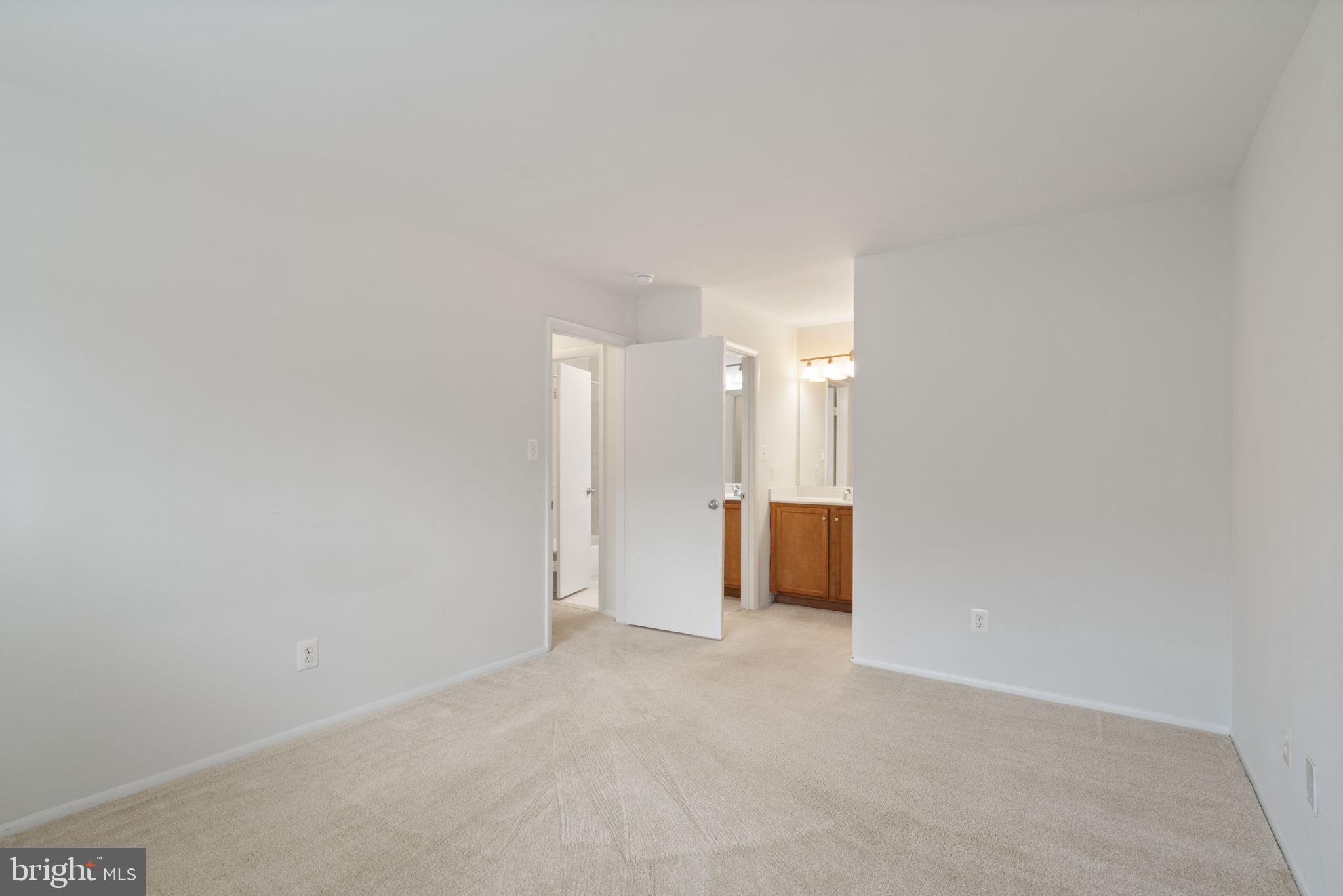 11703 Olde English Drive, Unit B Reston, VA 20190 - Photo 22 of 32 a view of an empty room