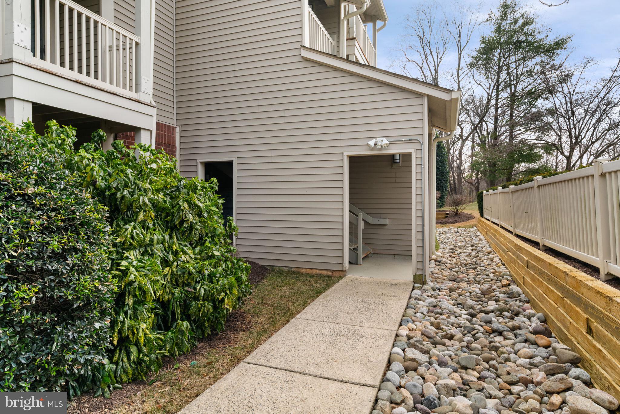 11703 Olde English Drive, Unit B Reston, VA 20190 - Photo 3 of 32 a house with a outdoor space