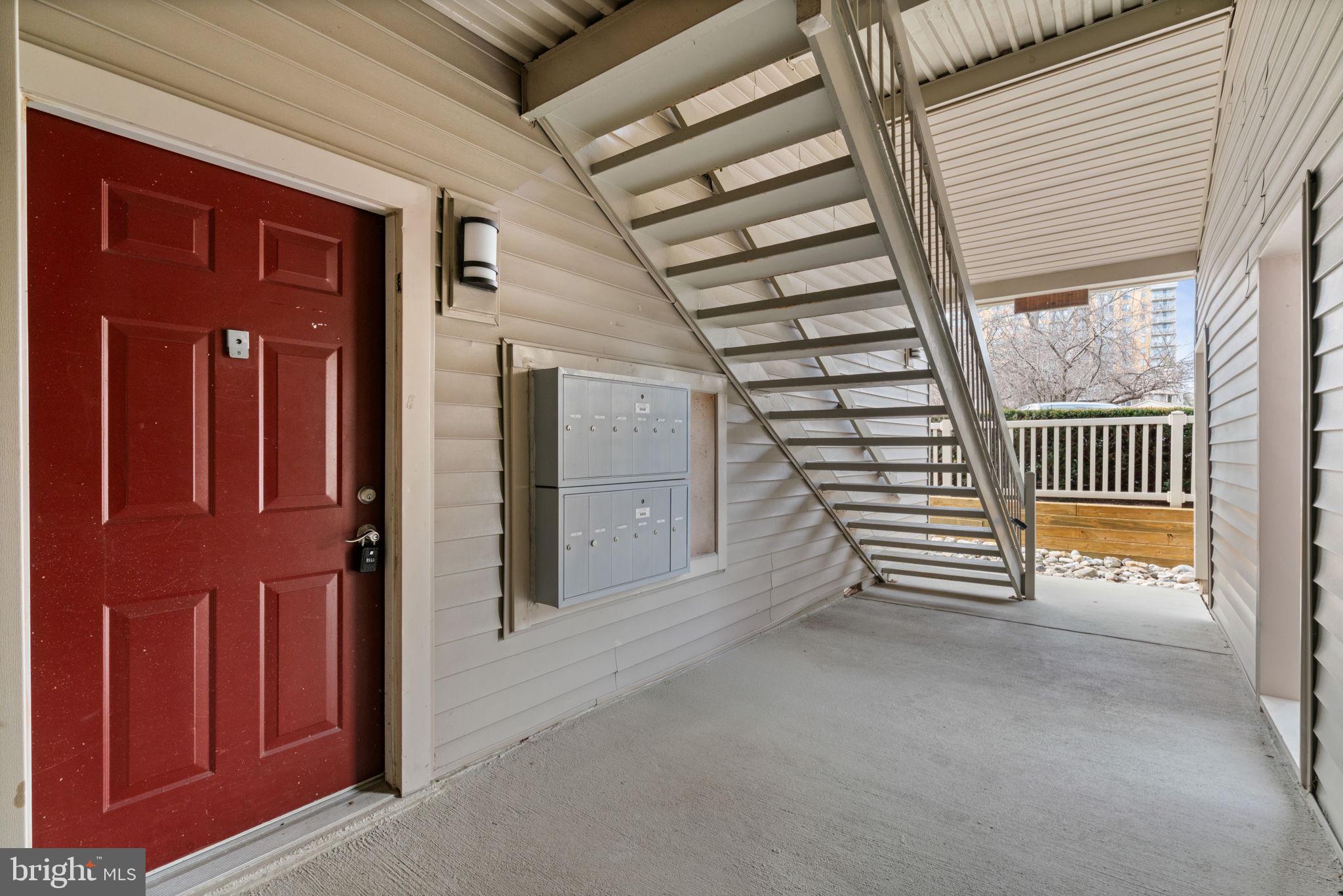 11703 Olde English Drive, Unit B Reston, VA 20190 - Photo 4 of 32 a view of entryway with stairs