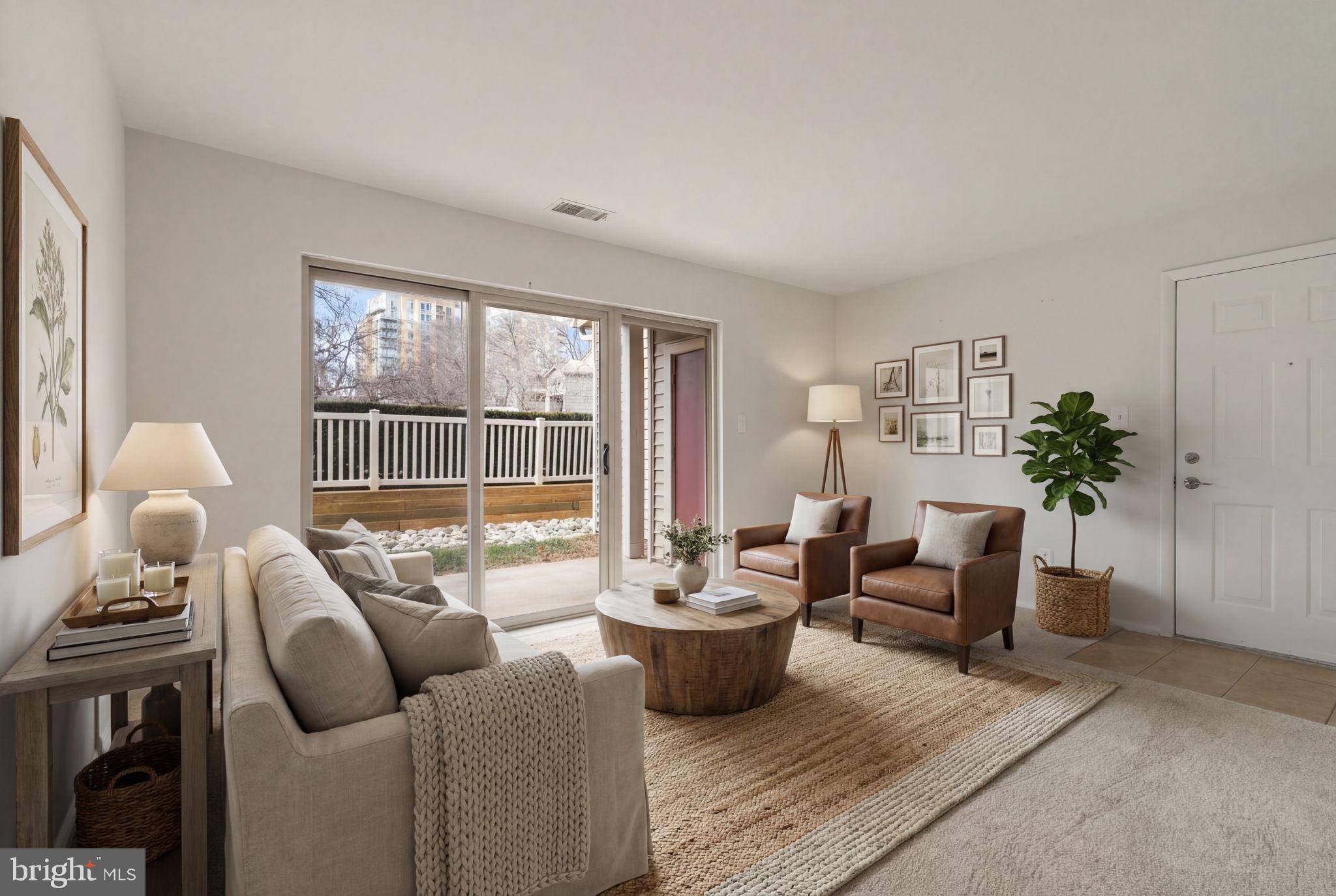11703 Olde English Drive, Unit B Reston, VA 20190 - Photo 6 of 32 a living room with furniture and a potted plant