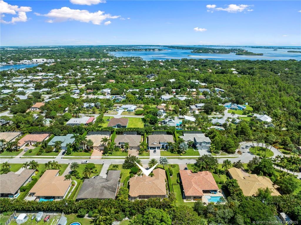 5020 Southeast Inlet Isle Way Stuart, FL 34997 - Photo 54 of 58 an aerial view of a house with a garden