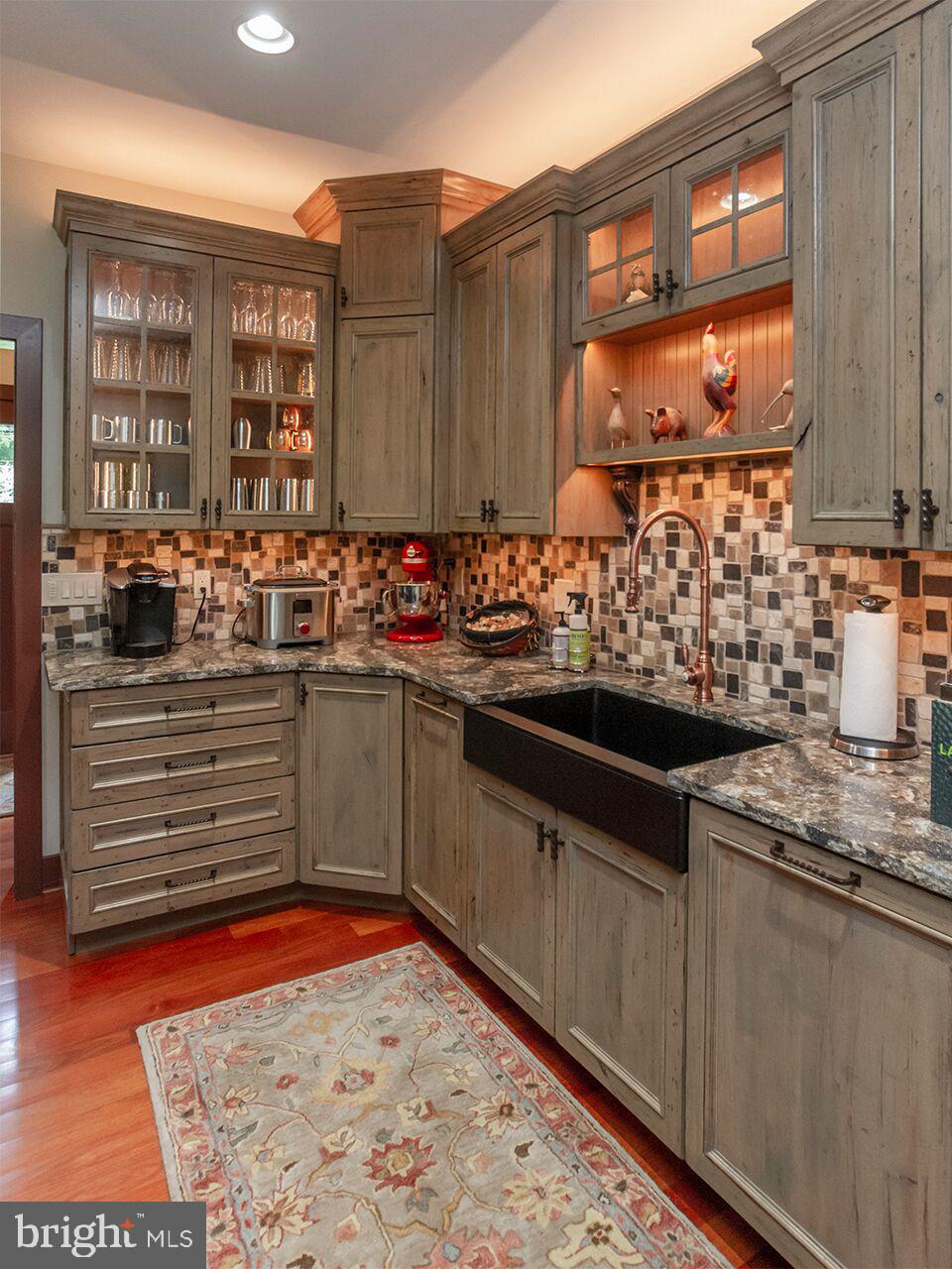 930 Corbett Road Monkton, MD 21111 - Photo 23 of 102 a kitchen with stainless steel appliances granite countertop a stove and cabinets