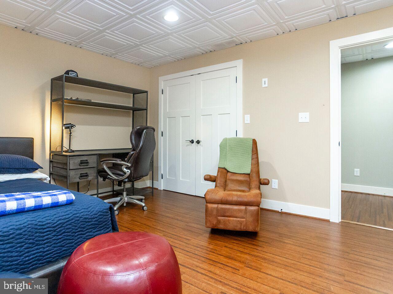 930 Corbett Road Monkton, MD 21111 - Photo 51 of 102 a living room with furniture and a wooden floor