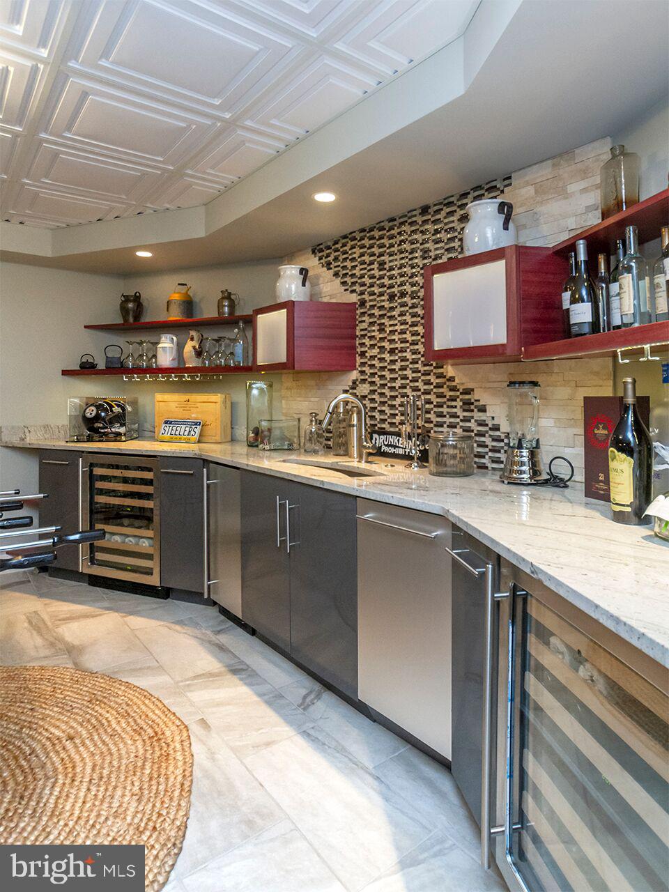 930 Corbett Road Monkton, MD 21111 - Photo 60 of 102 a kitchen with stainless steel appliances a sink and a stove