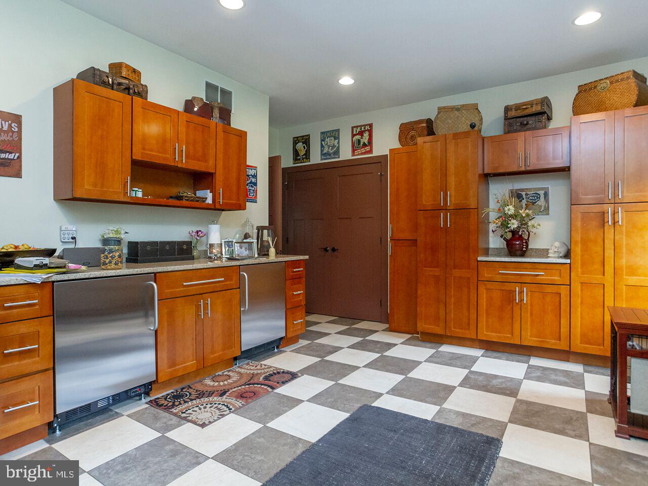 930 Corbett Road Monkton, MD 21111 - Photo 66 of 102 a kitchen with stainless steel appliances granite countertop a refrigerator and a sink