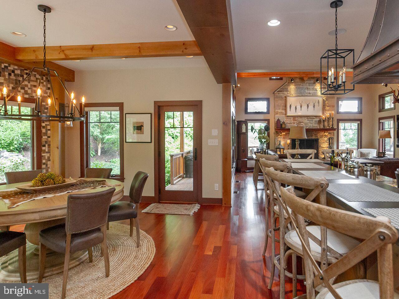 930 Corbett Road Monkton, MD 21111 - Photo 10 of 102 a view of a dining room with furniture window and wooden floor