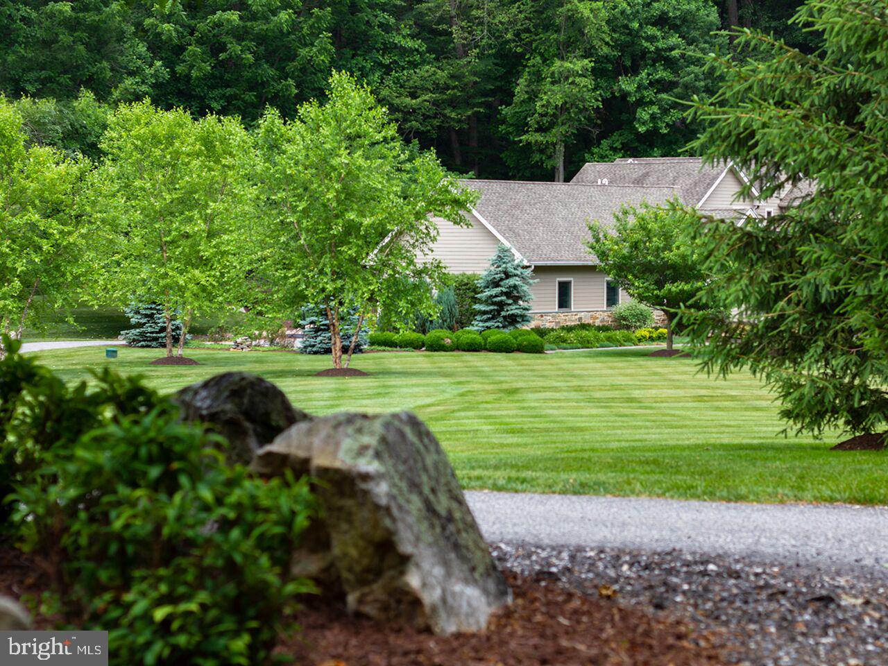 930 Corbett Road Monkton, MD 21111 - Photo 93 of 102 a view of a garden with a house