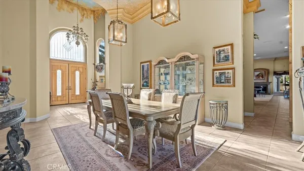a large kitchen with stainless steel appliances lots of counter space and a sink
