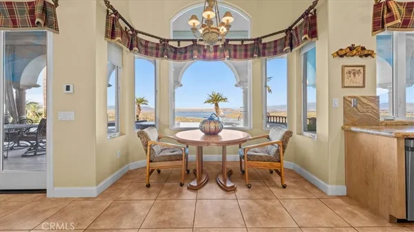 a spacious bathroom with a sink a mirror and a bathtub