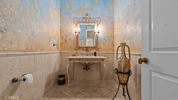 a view of a patio with a table and chairs