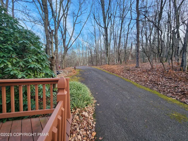 a view of a deck with a backyard