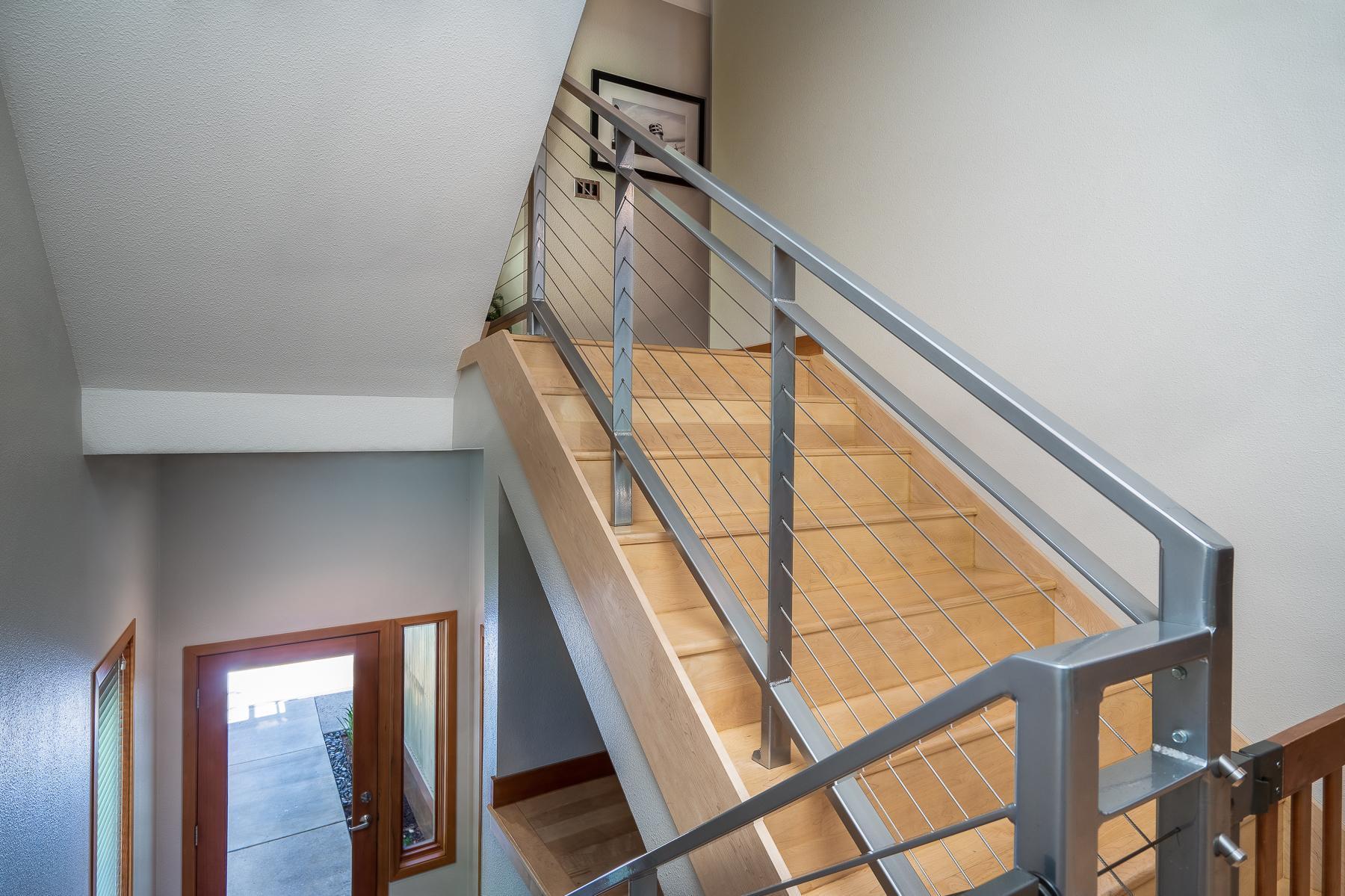 1985 Northwest Awbrey Road Bend, OR 97703 - Photo 4 of 37 a view of staircase with railing and white walls