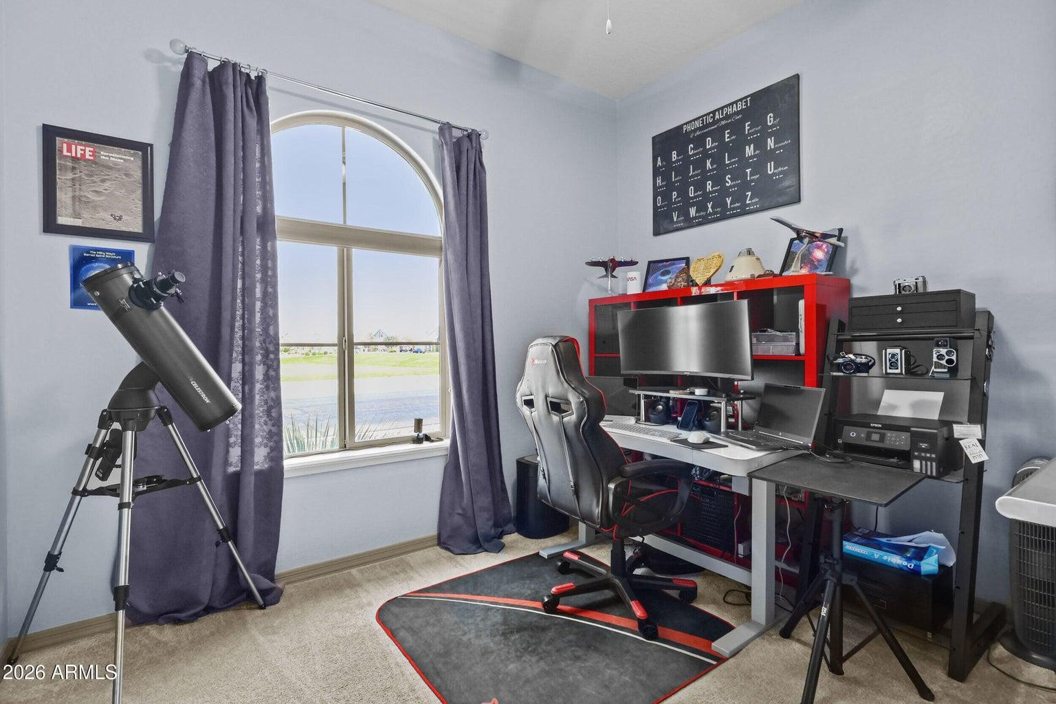4451 East Bernice Street Gilbert, AZ 85295 - Photo 20 of 32 a view of a workspace with furniture and a window