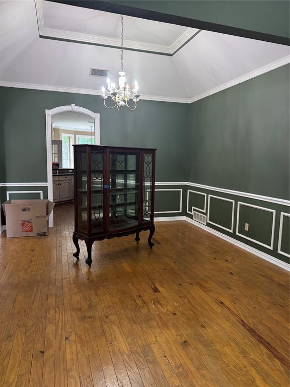 1704 South Bowen Road Pantego, TX 76013 - Photo 8 of 37 With a panned ceiling and luxury lighting, the dining is open to the library with easy access to the kitchen