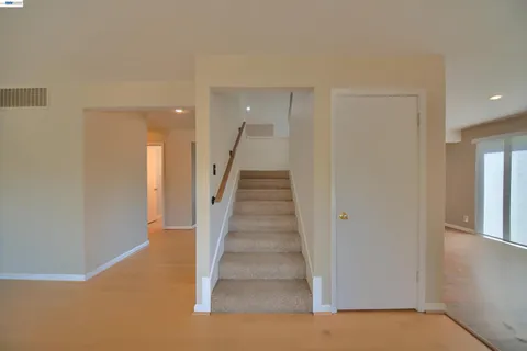a view of a bathroom from a hallway